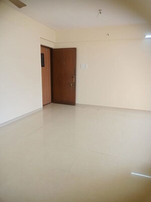 Room in 2 BHK Apartment at Rustomjee Riviera, Malad West – for Rent