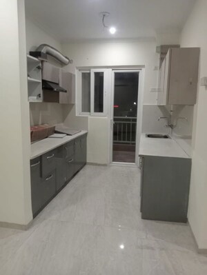 Kitchen in 2 BHK Apartment at Omega Windsor Greens, Faizabad Road – for Rent