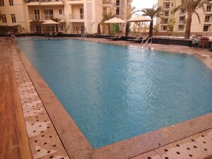 Swimming Pool in 2 BHK Apartment at Omega Windsor Greens, Faizabad Road – for Rent