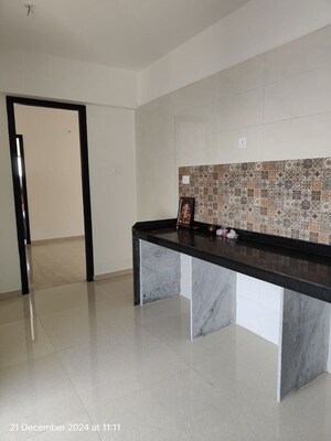 Kitchen in 2 BHK Apartment at Raj Infinia, Malad West – for Rent