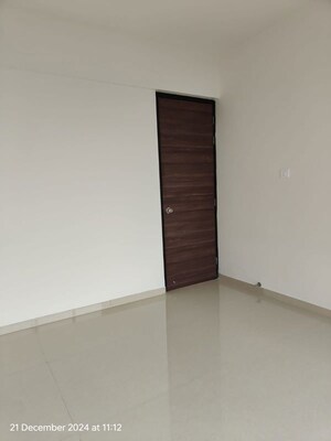 Room in 2 BHK Apartment at Raj Infinia, Malad West – for Rent