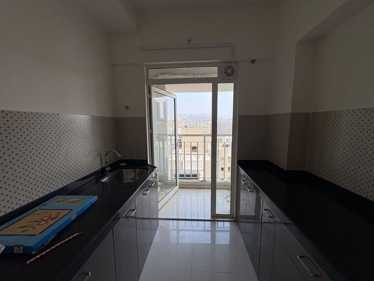 Kitchen, lodha-amara-wing-40-and-41 2 Bedroom 618 Sq.Ft. Apartment In Kolshet Road Thane 10346115