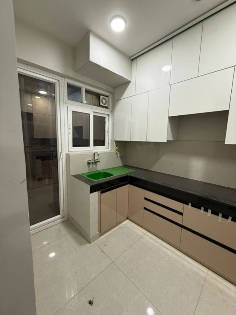 Kitchen, eldeco-live-by-the-greens 3 Bedroom 1404 Sq.Ft. Apartment In Sector 150 Noida 10346117
