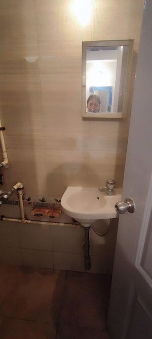 Bathroom in 1 BHK Apartment at Sai Krupa CHS Kandivali West, Kandivali West – for Sale