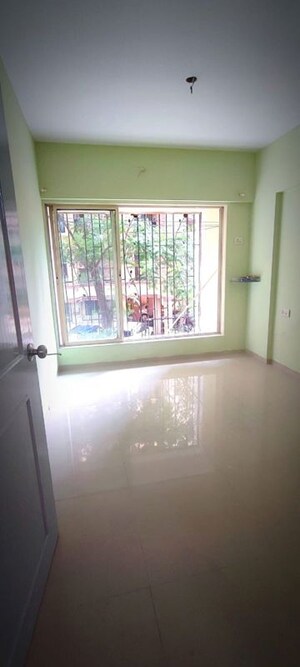 Room in 1 BHK Apartment at Sai Krupa CHS Kandivali West, Kandivali West – for Sale