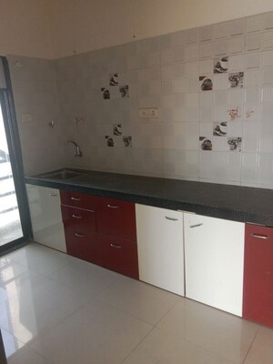 Kitchen in 2 BHK Apartment at Navkar City Phase II, Naigaon East – for Rent