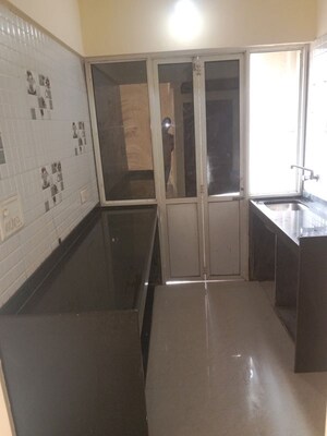Kitchen in 1 BHK Apartment at JSB Nakshatra Greens, Naigaon East – for Rent
