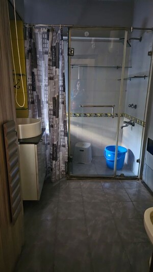 Bathroom in 3 BHK Apartment at Prateek Wisteria, Sector 77 – for Rent