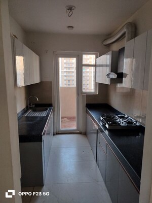 Kitchen in 3 BHK Apartment at Rishita Manhattan, Gomti Nagar – for Rent