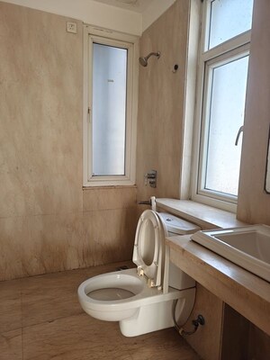 Bathroom in 3 BHK Apartment at Puri Diplomatic Greens Phase I, Sector 111 – for Rent