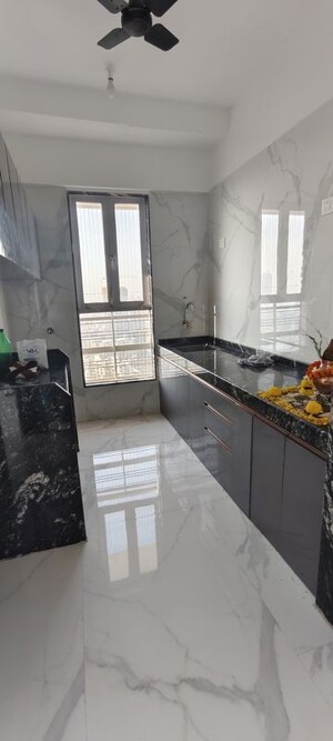 Kitchen in 1 BHK Apartment at Pramanik Walchand Paradise, Mira Road – for Sale