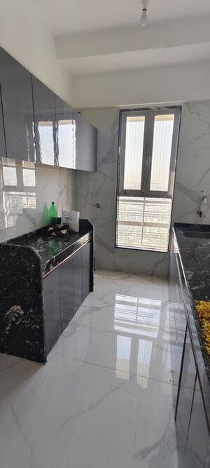 Kitchen in 1 BHK Apartment at Pramanik Walchand Paradise, Mira Road – for Sale