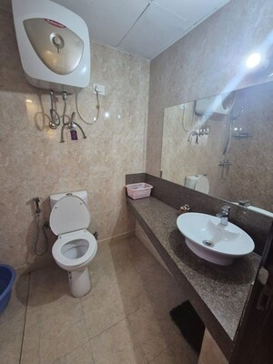 Bathroom in 3 BHK Apartment at ABA Cherry County, Tech Zone 4 Greater Noida – for Rent