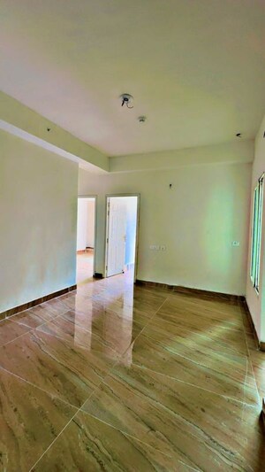 Room in 2 BHK Apartment at Shri Radha Sky Gardens, Sector 16b Greater Noida – for Rent