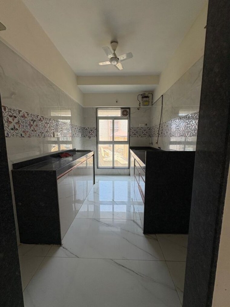 Kitchen, elite-the-crown 2 Bedroom 660 Sq.Ft. Apartment In Tilak Nagar Mumbai 10346348