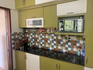 Kitchen in 3 BHK Apartment at Magarpatta Jasminium, Hadapsar – for Rent