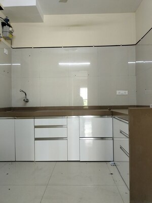 Kitchen in 2.5 BHK Apartment at Dosti Desire, Brahmand – for Rent