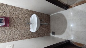 Bathroom in 1 BHK Apartment at Lodha Lakeshore Greens, Dombivli East – for Rent