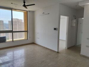 Living Room in 2 BHK Apartment at Hiranandani Delanna, Ghodbunder Road – for Rent