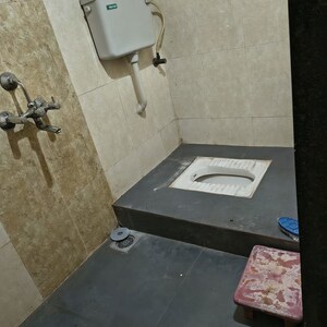 Bathroom in 2 BHK Apartment at Narmada CHS Kamothe, Kamothe – for Rent
