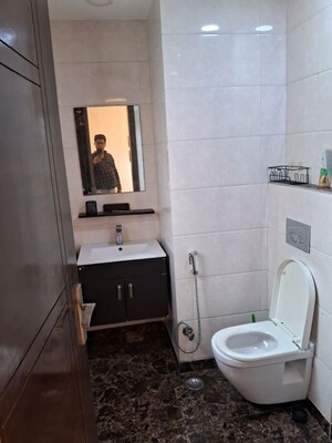 Bathroom in 3 BHK Apartment at Kailash Colony – for Rent