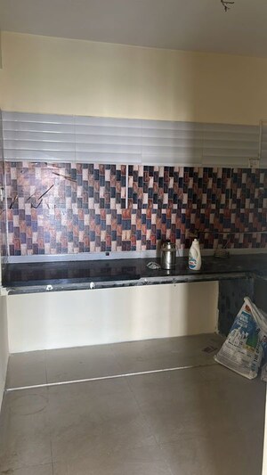 Kitchen in 2 BHK Apartment at Choice 24 Goodwill, Dhanori – for Rent