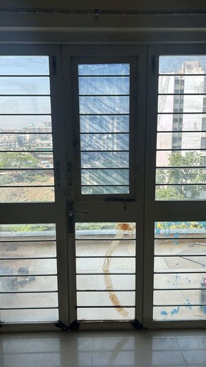 Room in 2 BHK Apartment at Choice 24 Goodwill, Dhanori – for Rent