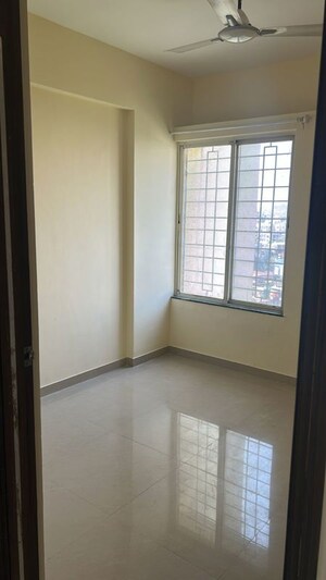 Room in 2 BHK Apartment at Choice 24 Goodwill, Dhanori – for Rent
