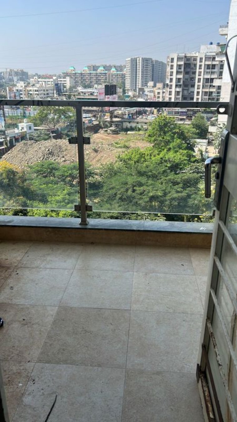 Balcony, choice-24-goodwill 2 Bedroom 800 Sq.Ft. Apartment In Dhanori Pune 10346748
