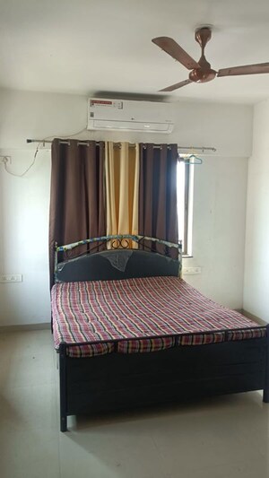 Bedroom in 2 BHK Apartment at Panama Silver Stone, Handewadi – for Rent