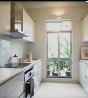 Kitchen in 2 BHK Apartment at Godrej Emerald, Ghodbunder Road – for Sale