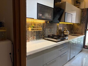 Kitchen in 2 BHK Apartment at Rajesh Raj Infinia, Malad West – for Rent