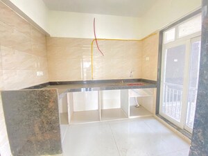 Kitchen in 1 BHK Apartment at Metropolis Bayside, Kasarvadavali – for Rent