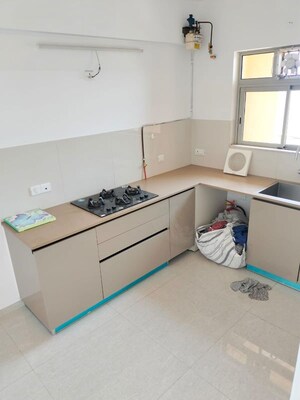 Kitchen in 2 BHK Apartment at Hiranandani Delanna, Ghodbunder Road – for Rent