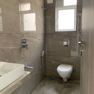 Bathroom in 2 BHK Apartment at Shraddha Elite, Poisar – for Rent