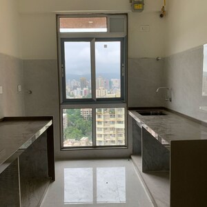 Kitchen in 2 BHK Apartment at Shraddha Elite, Poisar – for Rent