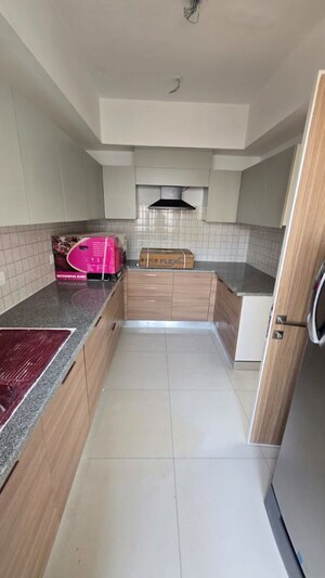 Kitchen in 3 BHK Apartment at Godrej Golf Links Exquisite, Sector 27 Yamuna Expressway – for Rent