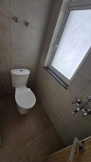 Bathroom in 3 BHK Apartment at Godrej Golf Links Exquisite, Sector 27 Yamuna Expressway – for Rent