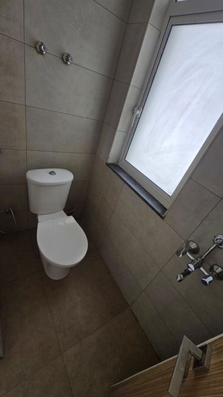 Bathroom, godrej-golf-links-exquisite 3 Bedroom 1788 Sq.Ft. Apartment In Sector 27 Yamuna Expressway Greater Noida 10347097