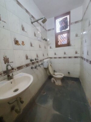 Bathroom in 2 BHK Builder Floor at Green Fields Colony – for Rent