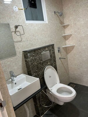 Bathroom in 3 BHK Apartment at Maxxus Elanza, International Airport Road – for Rent
