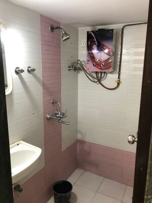 Bathroom in 1 BHK Apartment at Rajshree Iris, Tilak Nagar – for Rent