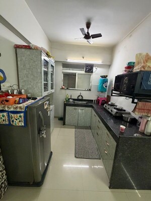 Kitchen in 1 BHK Apartment at Mantra Insignia, Mundhwa – for Rent