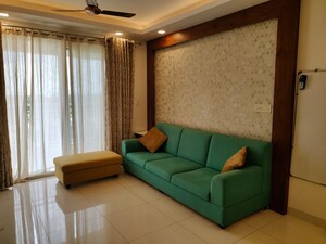 Living Room in 2 BHK Apartment at Puravankara Palm Beach, Hennur – for Rent