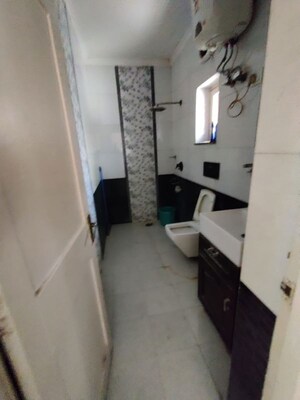 Bathroom in 3 BHK Apartment at AWHO Brahmaputra Apartments, Sector 29 – for Rent