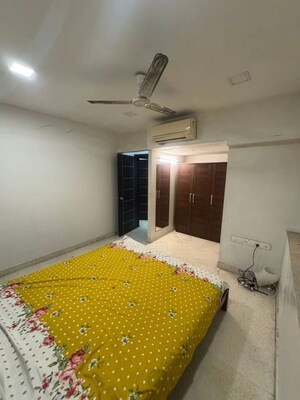 Bedroom in 3 BHK Apartment at Om Sai CHS Andheri West, Andheri West – for Rent