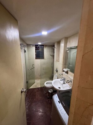Bathroom in 3 BHK Apartment at Om Sai CHS Andheri West, Andheri West – for Rent