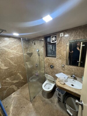 Bathroom in 3 BHK Apartment at Om Sai CHS Andheri West, Andheri West – for Rent