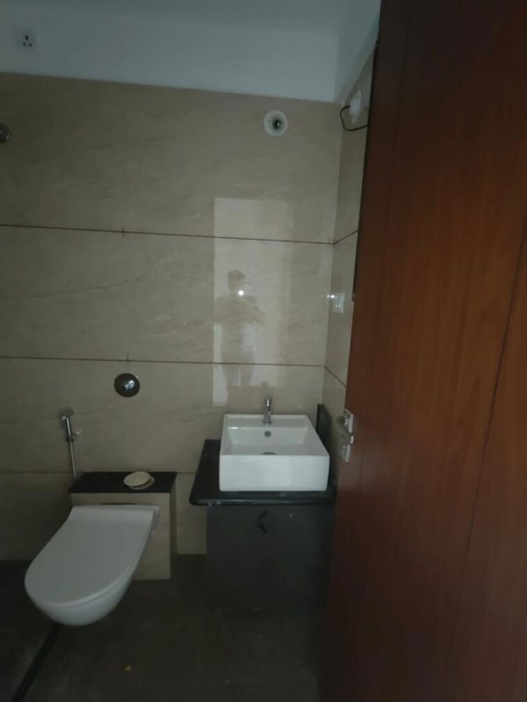Bathroom, rhythm-society 2 Bedroom 750 Sq.Ft. Apartment In Wakad Pune 10347417