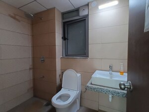 Bathroom in 1 BHK Apartment at Kalpataru Immensa B, Kolshet Road – for Rent